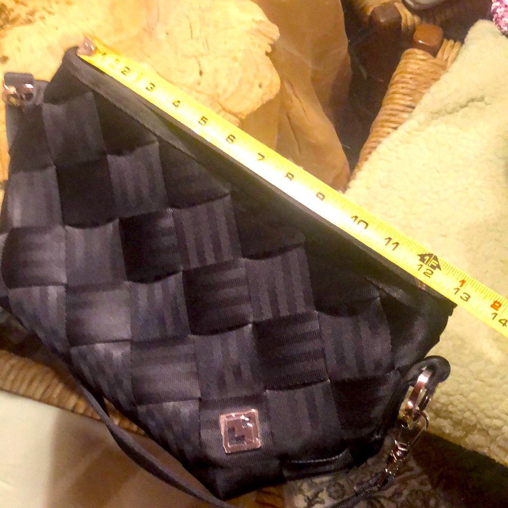 Maggie bags genuine seatbelt webbing,like plastic cover emblem new with out tag